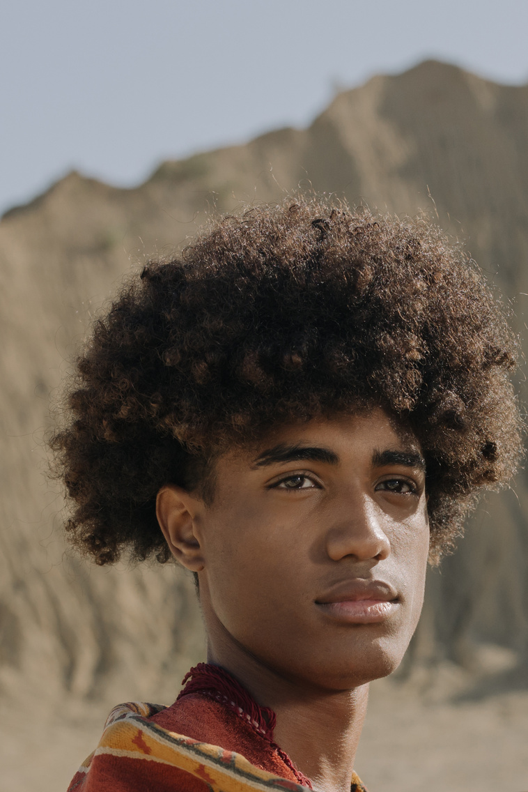 A Young Man with Afro Hair