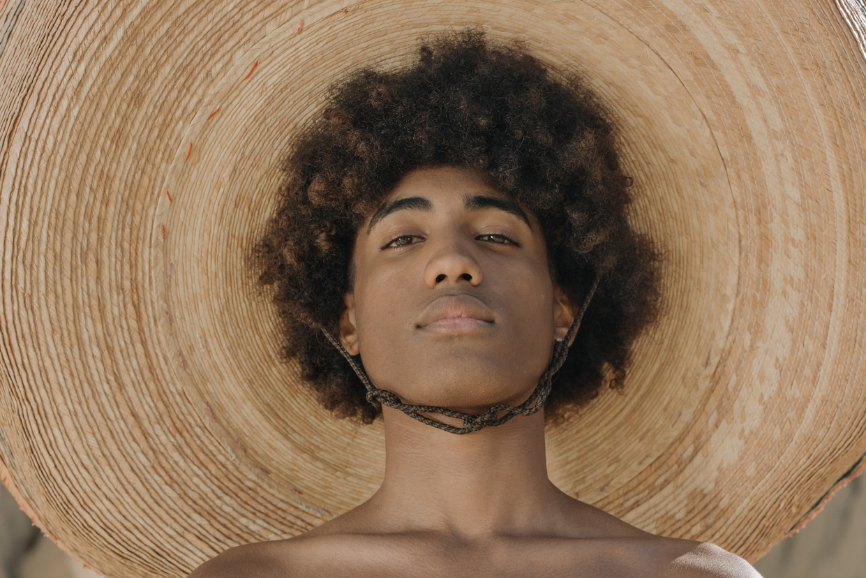 A Man's Head over a Tree Stump