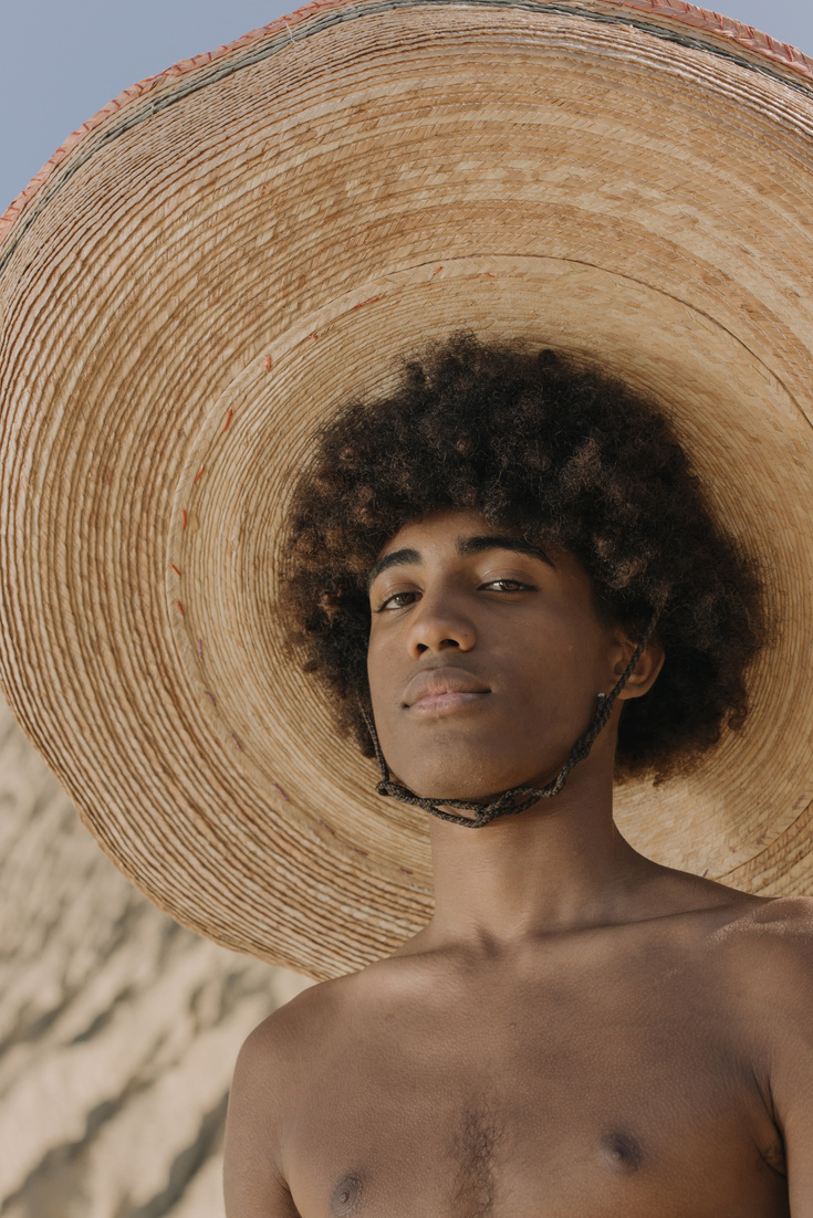 Woman in Brown Sun Hat