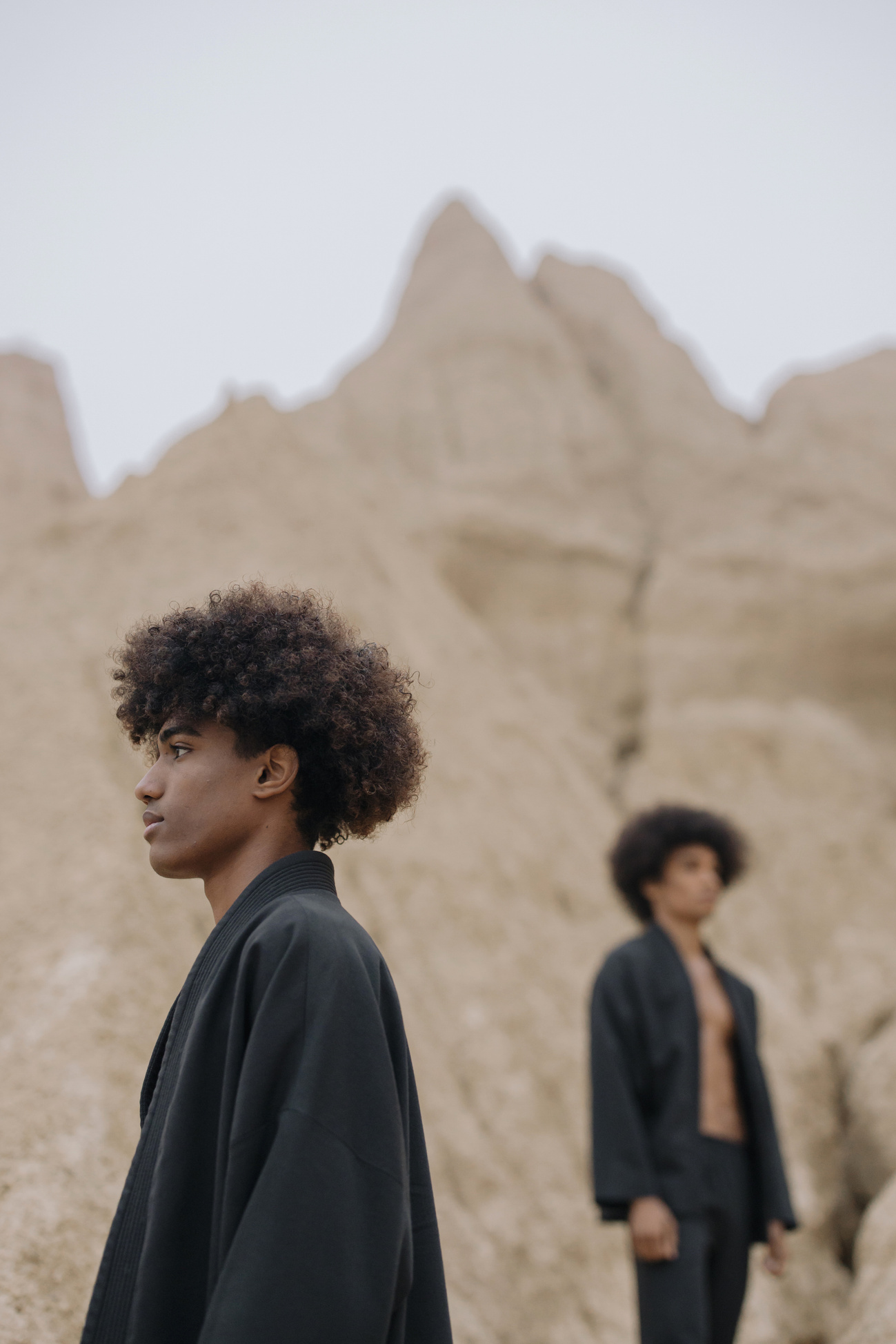 Men in an Afro Hair and Black Kimono